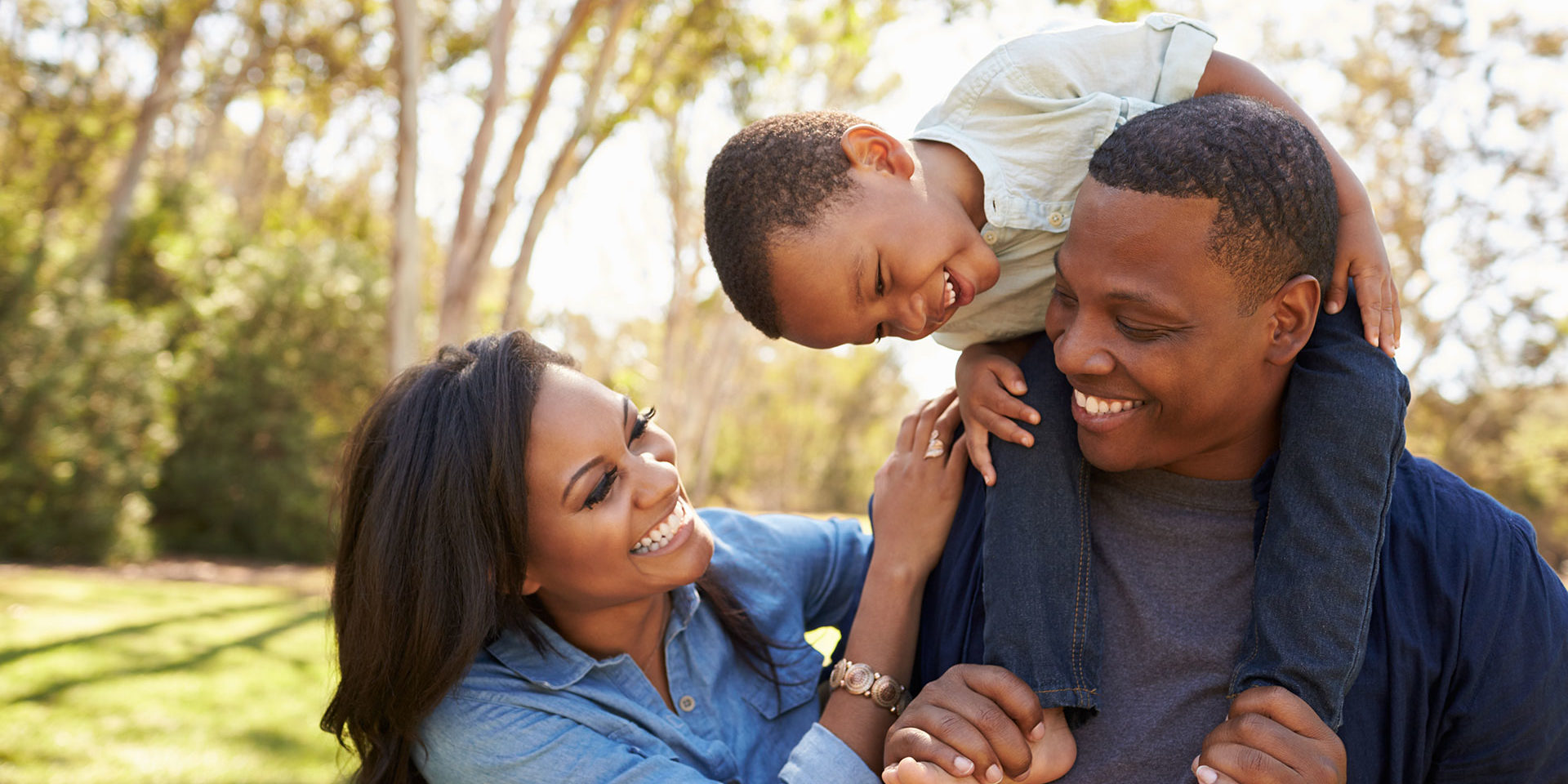 Happy family spending time together in nature