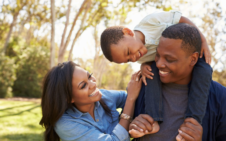 Happy family spending time together in nature