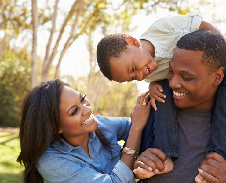 Happy family spending time together in nature